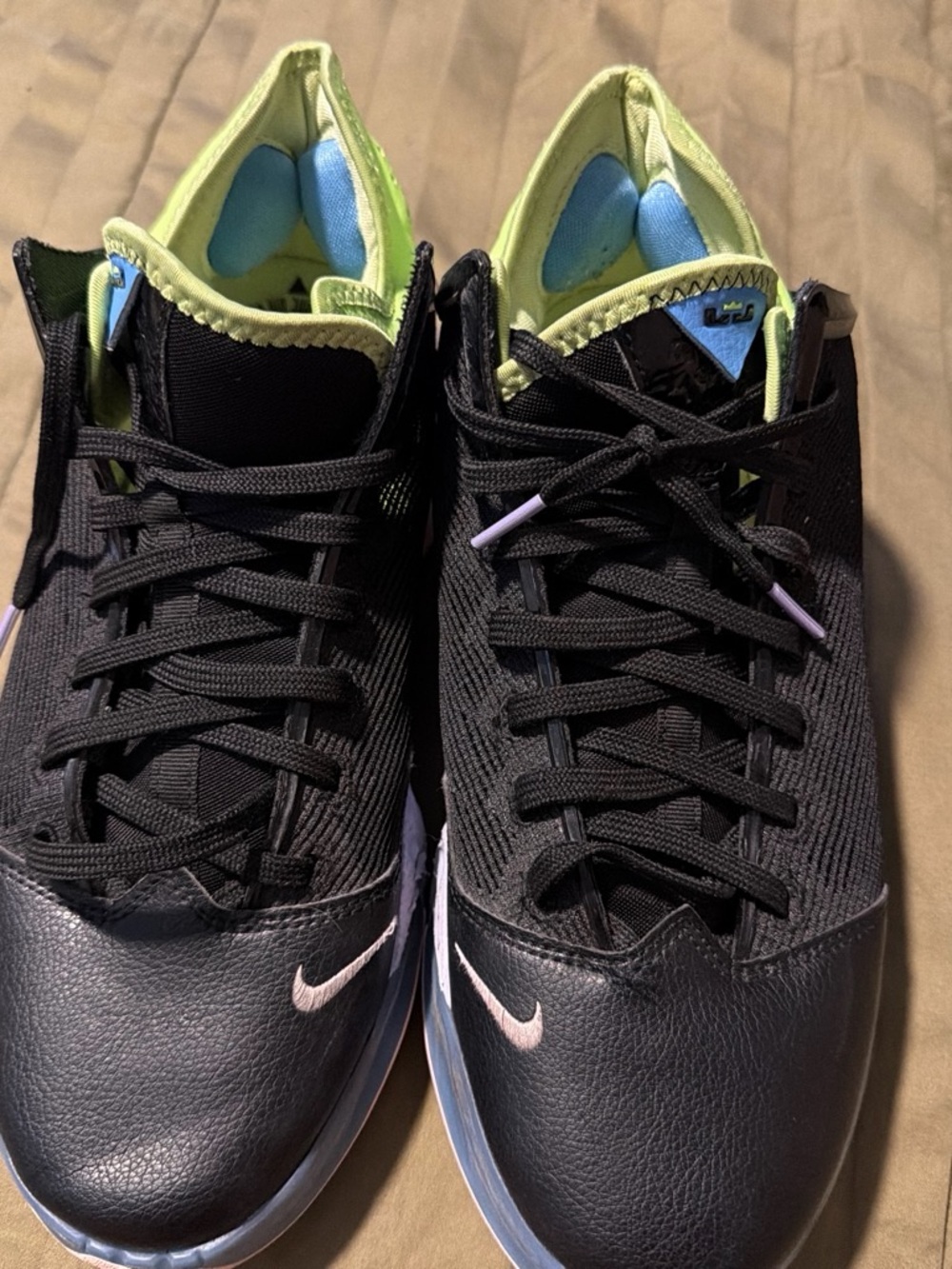 Nike Black Sneakers with Lime Green and Light Blue Accents